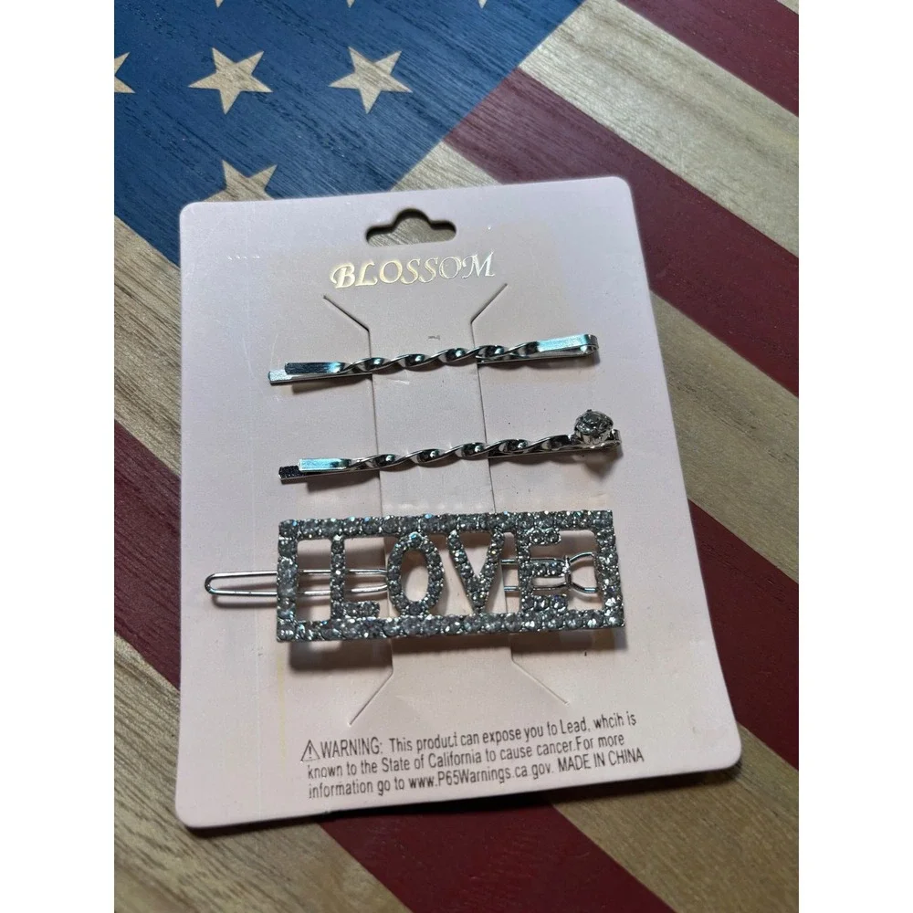 #42. Silver-tone hair clips